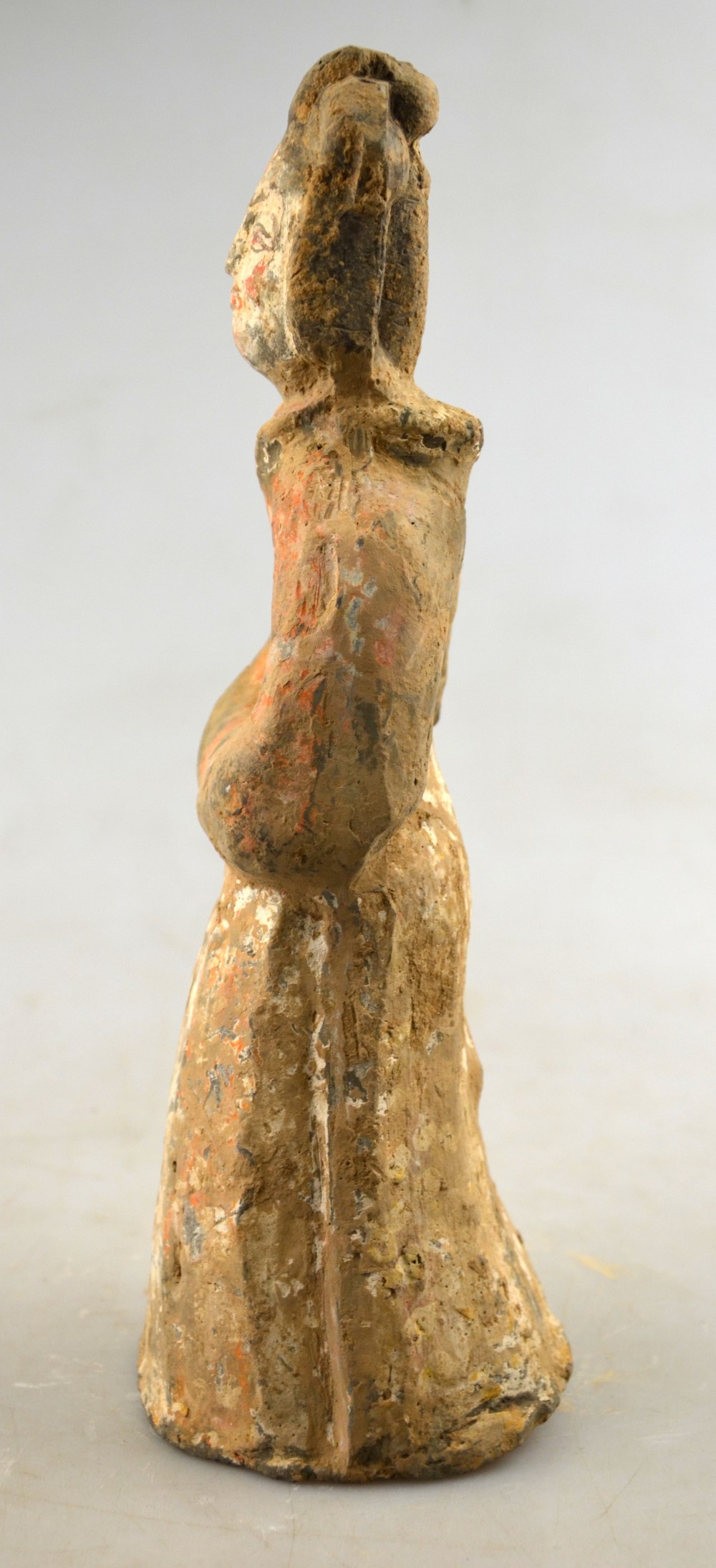 Chinese 5th century AD - a pottery funerary figure of a standing court lady, her arms folded, - Image 4 of 7