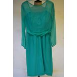 A 1950/60's silk dress by 'Helen' with Persian design in green/turquoise/lilac with jewelled