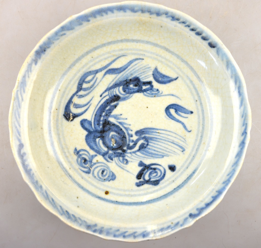 A Chinese blue and white shallow bowl decorated with a stylised bird amidst flowers and foliage, mid - Image 6 of 6