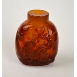 A Chinese agate snuff bottle carved with a horse and pine tree, 6 cm h.