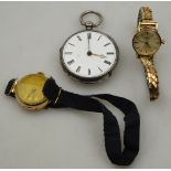 A 1940's lady's 9ct gold wristwatch on moire silk strap,