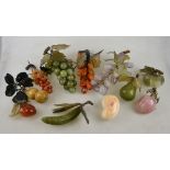 A collection of Chinese hardstone, onyx and quartz fruit including pear, peach, apple,