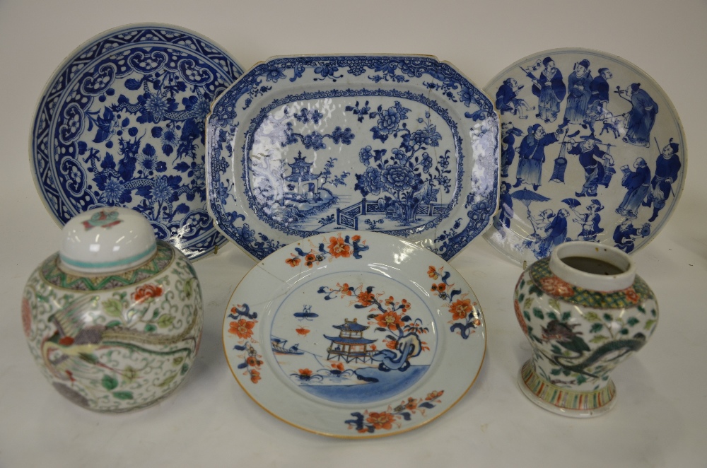 A Chinese 18th century blue and white chamfered meat dish decorated with flowers, buildings and pine