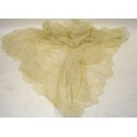 A box of lace to include a mantilla, a Maltese lace shawl, cream needle-run shawl,