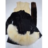 Two boxes and a vintage Marshall & Snelgrove box containing a Persian lamb jacket, black fur jacket,