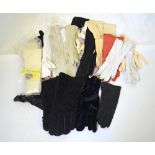 A large quantity of assorted vintage gloves to include kid leather, astrakhan, leather, fabric, etc.