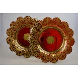 A pair of 19th century Continental ruby glass shallow dishes having a star cut  base and shaped