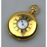 An 18ct gold half-hunter pocket watch with top-wind movement no.