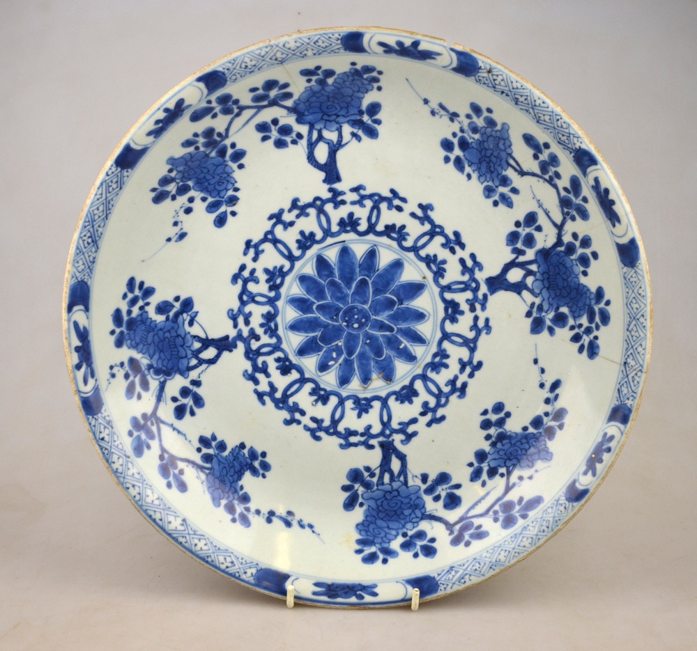 A Chinese 17th century blue and white dish decorated with a central flower head surrounded by - Image 3 of 13