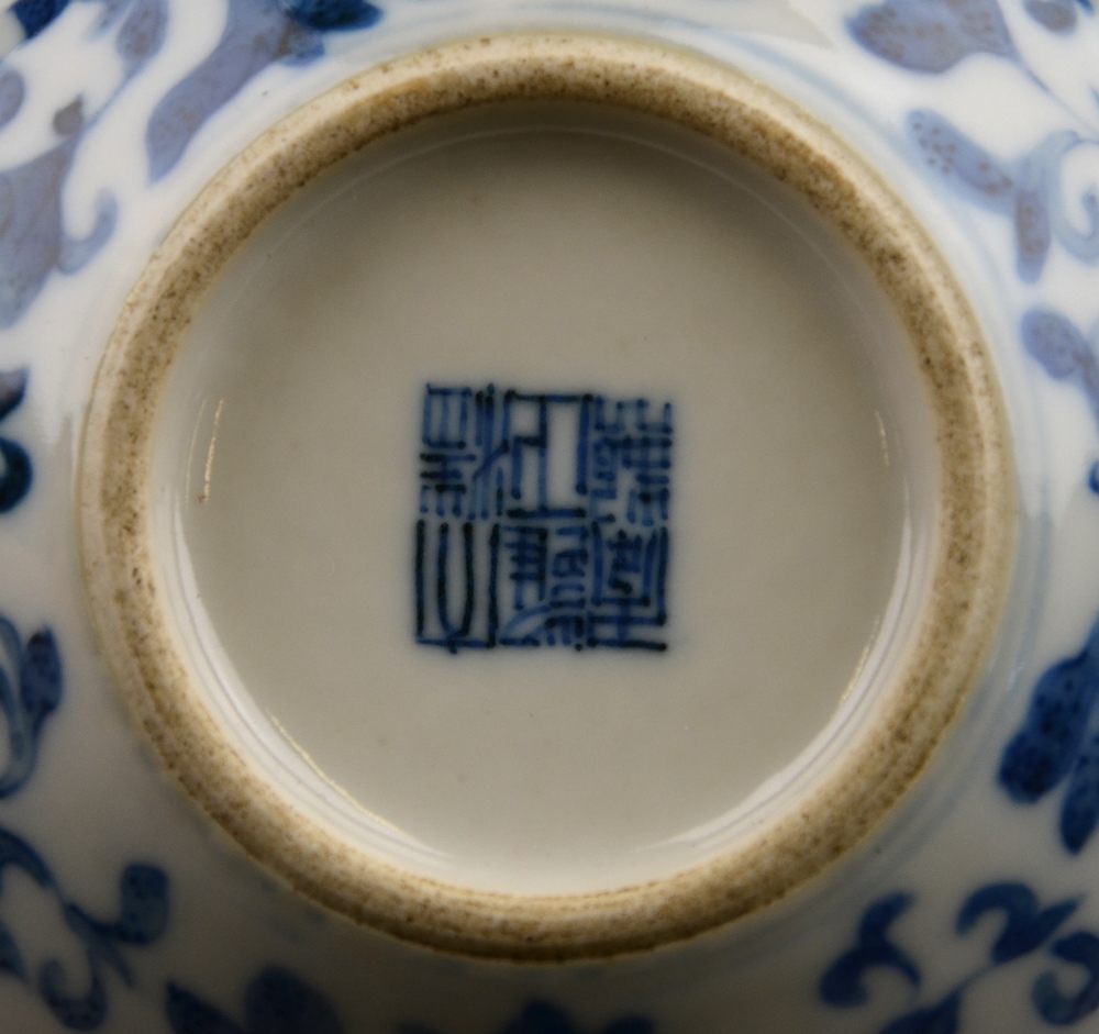 A Chinese blue and white bottle vase decorated with flowers and foliage, Yongzhing seal mark but - Image 3 of 4