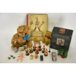 A boxed Singer toy sewing machine, The Strewelpeter Alphabet (book),