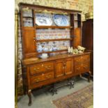 An 18th century Shropshire mahogany cross-banded oak high dresser,