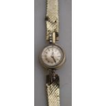 A lady's 9ct white gold Tissot wristwatch with 17-jewel movement, on mesh strap set with six small