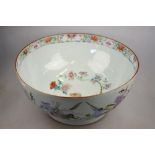 A Chinese 18th century famille rose bowl extensively decorated to the exterior with mounted