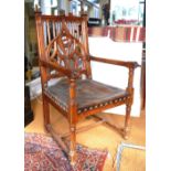 A 19th century French walnut armchair in the Gothic style,