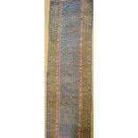 An antique Kurdish long runner, the camel ground with stylised floral design, 4.33 x 1.16 m