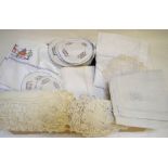 A box of table linen to include tablecloths with deep crocheted borders, embroidered examples,