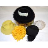 A large black velvet Frederick Fox designer hat trimmed with swan's down, a black Frederick Fox