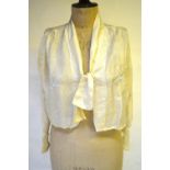 A 1940's yellow spotted blouse, an embroidered Chinese silk blouse,