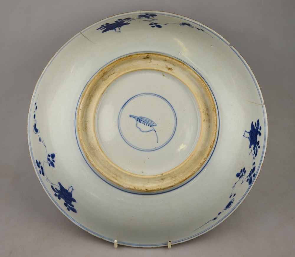 A Chinese 17th century blue and white dish decorated with a central flower head surrounded by - Image 4 of 13