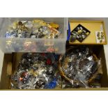 A box of assorted sets of vintage buttons,