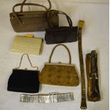 Two boxes containing ten vintage handbags including crocodile and snakeskin examples,