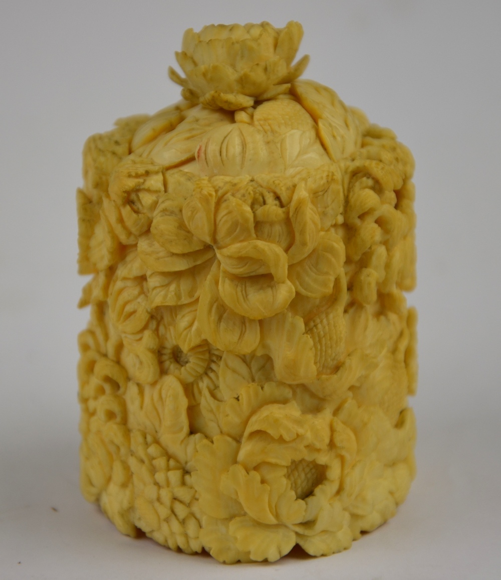 A 19th century Chinese Canton ivory oval pot and cover carved with chrysanthemums and other flowers, - Image 2 of 6