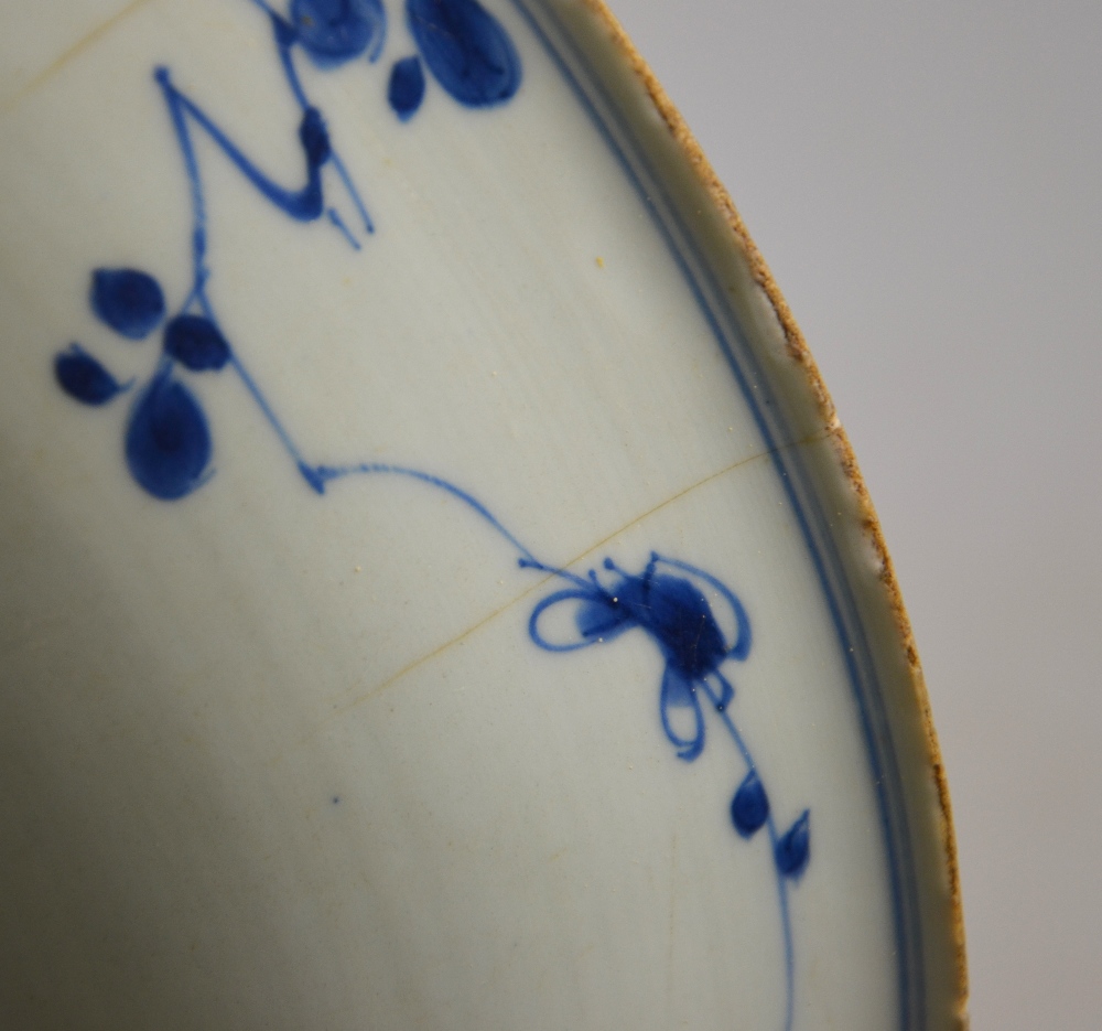 A Chinese 17th century blue and white dish decorated with a central flower head surrounded by - Image 6 of 13