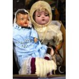 Three composition dolls (one Chinese),