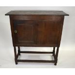 A late 17th/18th century jointed oak hatch cupboard,