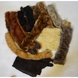 A box containing three fur hats (two being mink) and an assortment of fur pieces and collars etc.