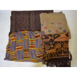 Three vintage tribal cloths, Ghanian, Kente and Hinxii, to/w 20th century Sarawak skirt Condition