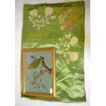 A vibrant green silk coverlet floral embroidered to four corners and centre with linen backing,