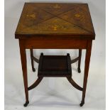 A Victorian satinwood inlaid rosewood envelope card table having a baize lined interior over a