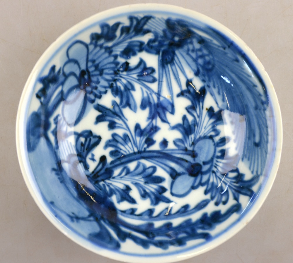 A Chinese blue and white shallow bowl decorated with a stylised bird amidst flowers and foliage, mid - Image 3 of 6