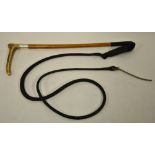 A leather hunting-whip, the antler handle with silver ferrule, London 1917,
