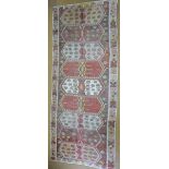 An antique Anatolian kelim, woven in two narrow panels combined, geometric design, mellow colours,