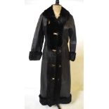 A long length black leather coat with bl