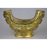A Chinese brass vessel of archaic form,