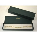 A 9ct yellow gold linked bracelet with m