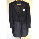 A gentleman's cream linen suit, a navy w