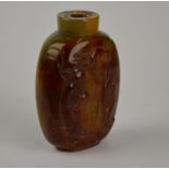 A Chinese agate snuff bottle carved with