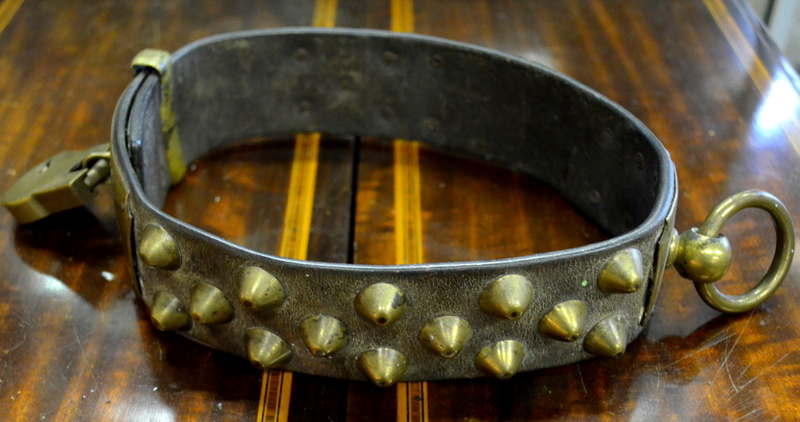 A 19th century French leather hunting-dog collar with brass ring, studs and padlock, plaque engraved