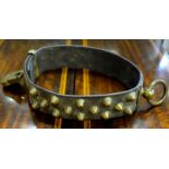 A 19th century French leather hunting-dog collar with brass ring, studs and padlock, plaque engraved