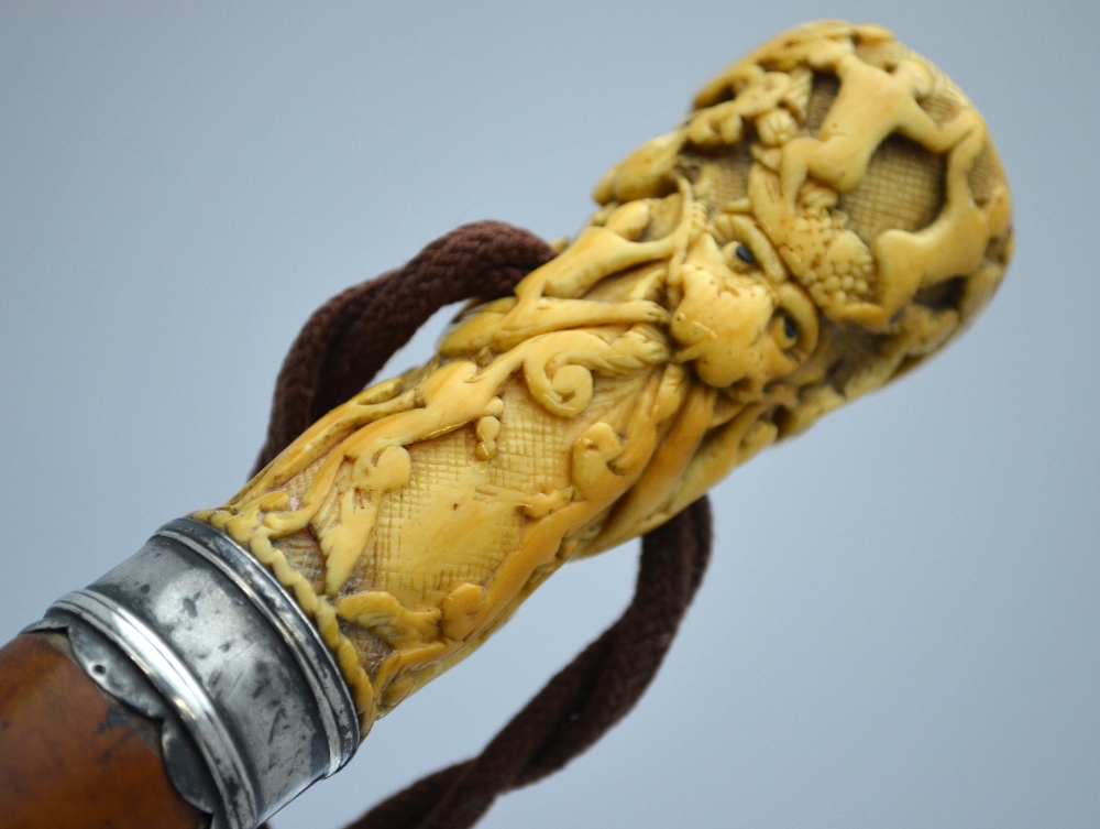 An 18th century malacca walking cane with white metal ferrule and ivory pommel, - Image 2 of 4