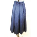 A deep blue heavy satin evening skirt with stiff net petticoat,
