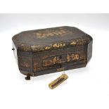 A Chinese 19th century black lacquer octagonal workbox, the hinged cover decorated in gilt with