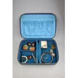 Blue leather jewel box containing various items including unmarked tubular bangle,