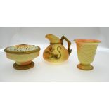 A Royal Worcester blush ground lizard jug with basket weave moulded body, shape 1714, 15 cm to/w a