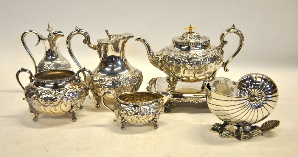 A Victorian oval electroplated four-piece tea service, to/w a nautilus shell spoon-warmer,